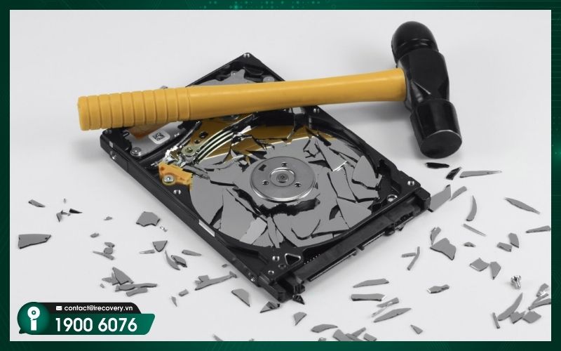 Industrial-grade data destruction services involving the physical crushing and shredding of hard drive components.